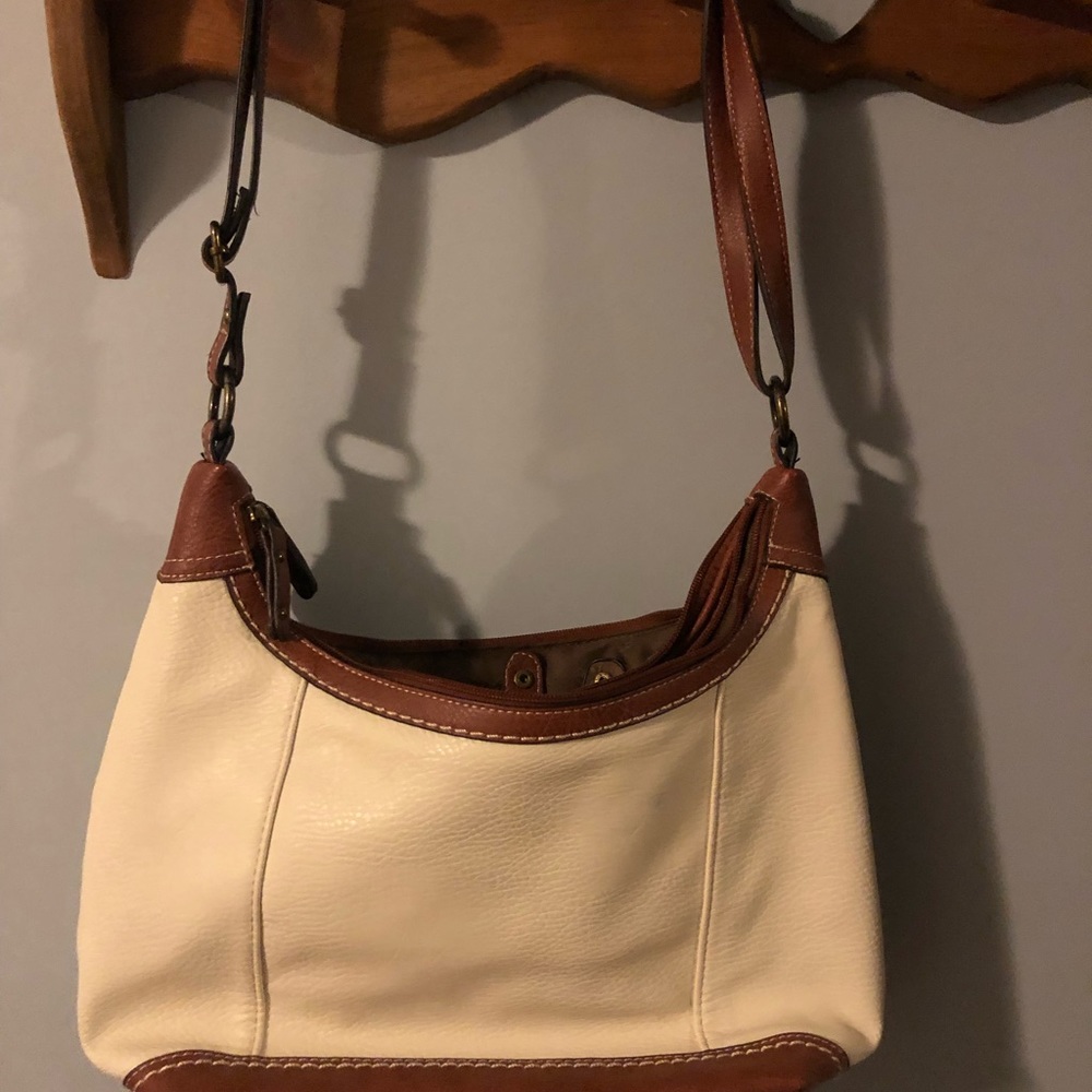 Adjustable strap shoulder bag.  Brand new.  Never used.  No tags.